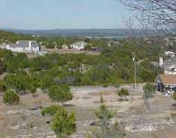 View 22122 Moulin 22122 Moulin - front exterior - Luxury lot in Spicewood, TX