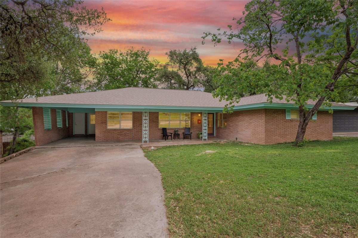 View 2213 Rebel RD in Twin Oaks Add 2213 Rebel RD - front exterior - Luxury home in Twin Oaks Add, Austin, TX