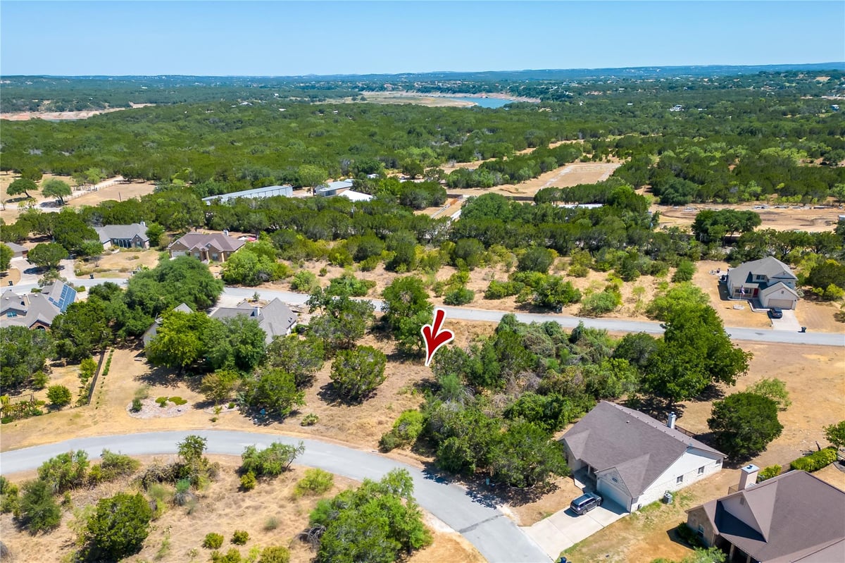 View 222 Wesley Ridge Dr in The Point At Ridge Harbor 222 Wesley Ridge Dr - front exterior - Luxury lot in The Point At Ridge Harbor, Spicewood, TX