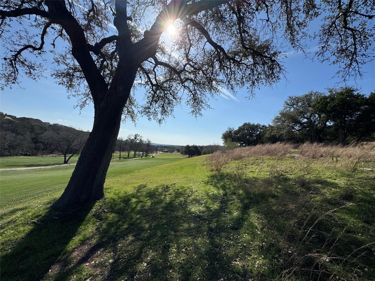 Primary bedroom at 2220 Annassa Ct Unit #76 - Wild Rock Residential Condominiums, Crystal Falls, Leander, TX