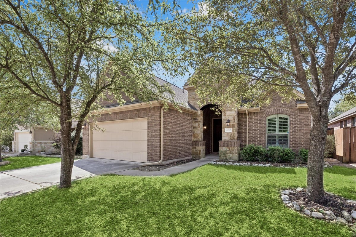 View 2220 Lookout Range Dr in Bluffs at Crystal Falls 2220 Lookout Range Dr - front exterior - Luxury home in Bluffs at Crystal Falls, Leander, TX