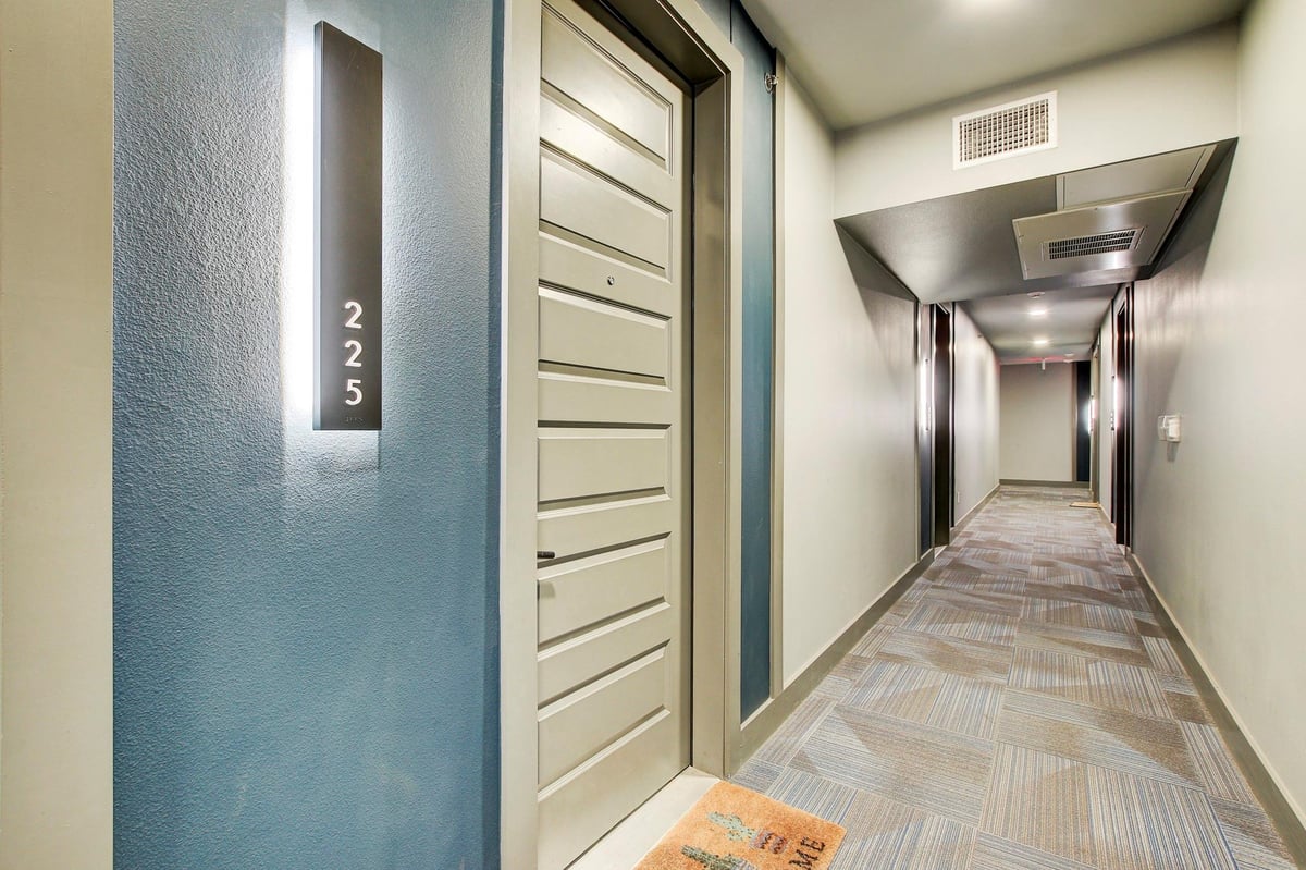 Primary bedroom at 2220 Webberville Rd Unit #225 - Axiom East Condos, Austin, TX