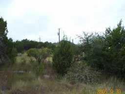 View 22207 Shotts DR 22207 Shotts DR - front exterior - Luxury lot in Spicewood, TX