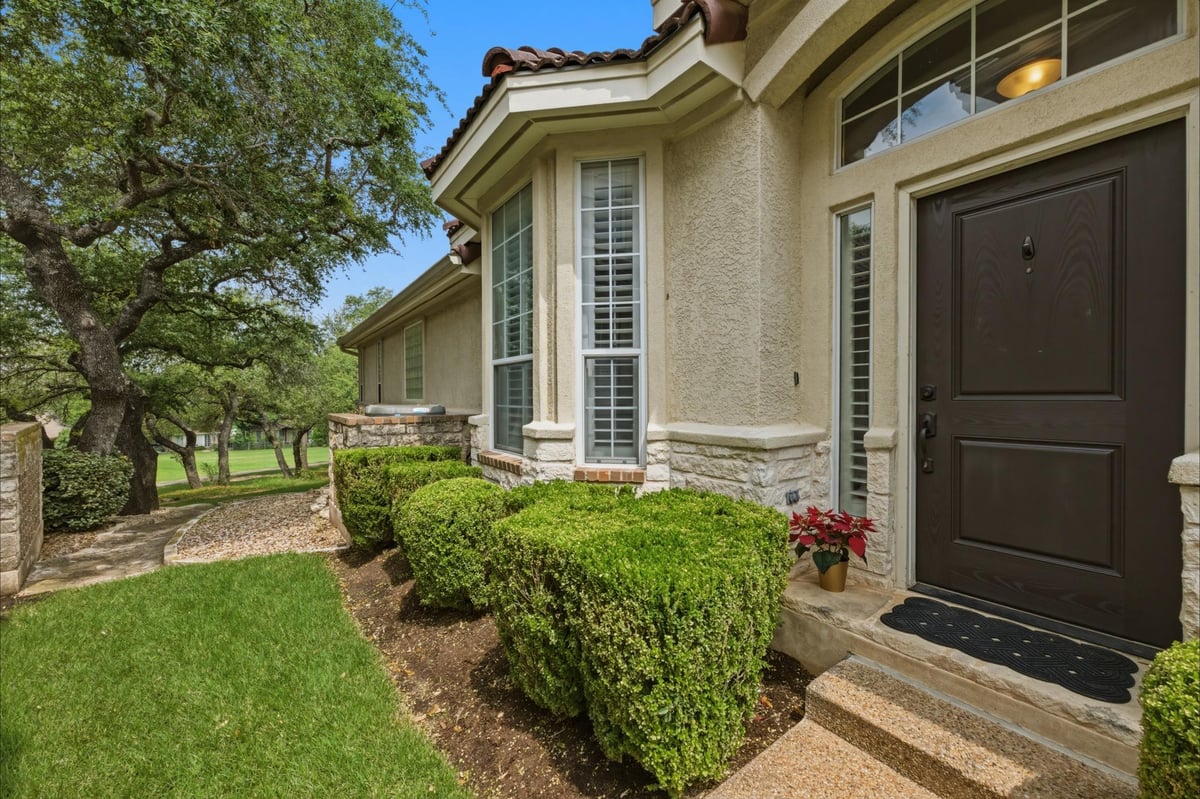 View 223 The Hills DR Unit #3 in Lakeside & Greens Condo 223 The Hills DR Unit #3 - front exterior - Luxury home in Lakeside & Greens Condo, Austin, TX
