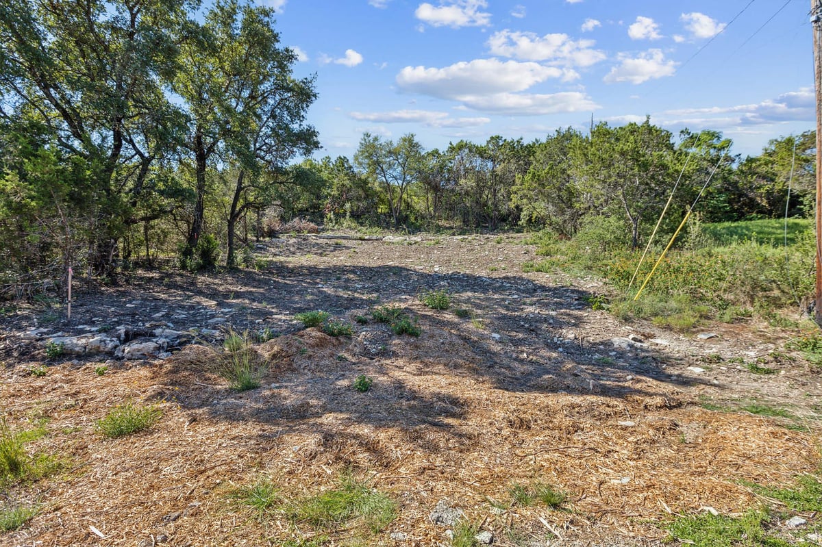 View 22305 Bute DR in Briarcliff Inc Sec 06 22305 Bute DR - front exterior - Luxury lot in Briarcliff Inc Sec 06, Spicewood, TX
