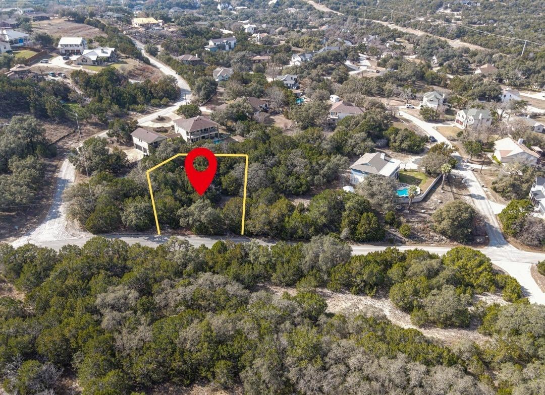 View 22314 Briarcliff Dr in Briarcliff Inc Sec 09 Amd 22314 Briarcliff Dr - front exterior - Luxury lot in Briarcliff Inc Sec 09 Amd, Briarcliff, TX