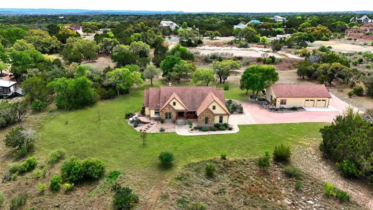 View 225 Blue Water CV in Lost Springs Sub Sec 2 225 Blue Water CV - front exterior - Luxury home in Lost Springs Sub Sec 2, Wimberley, TX