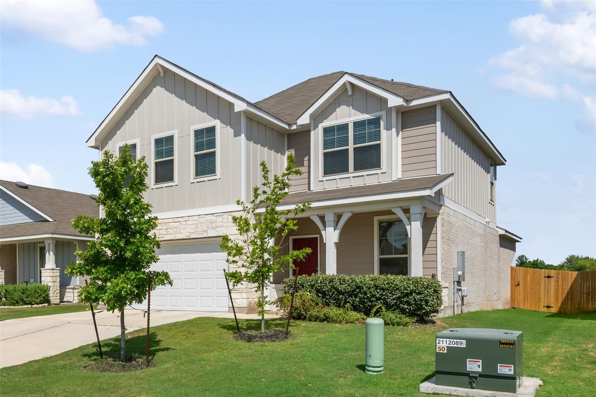 225 Gunther Way - front exterior - Luxury home in The Grove at Bull Creek, Taylor, TX