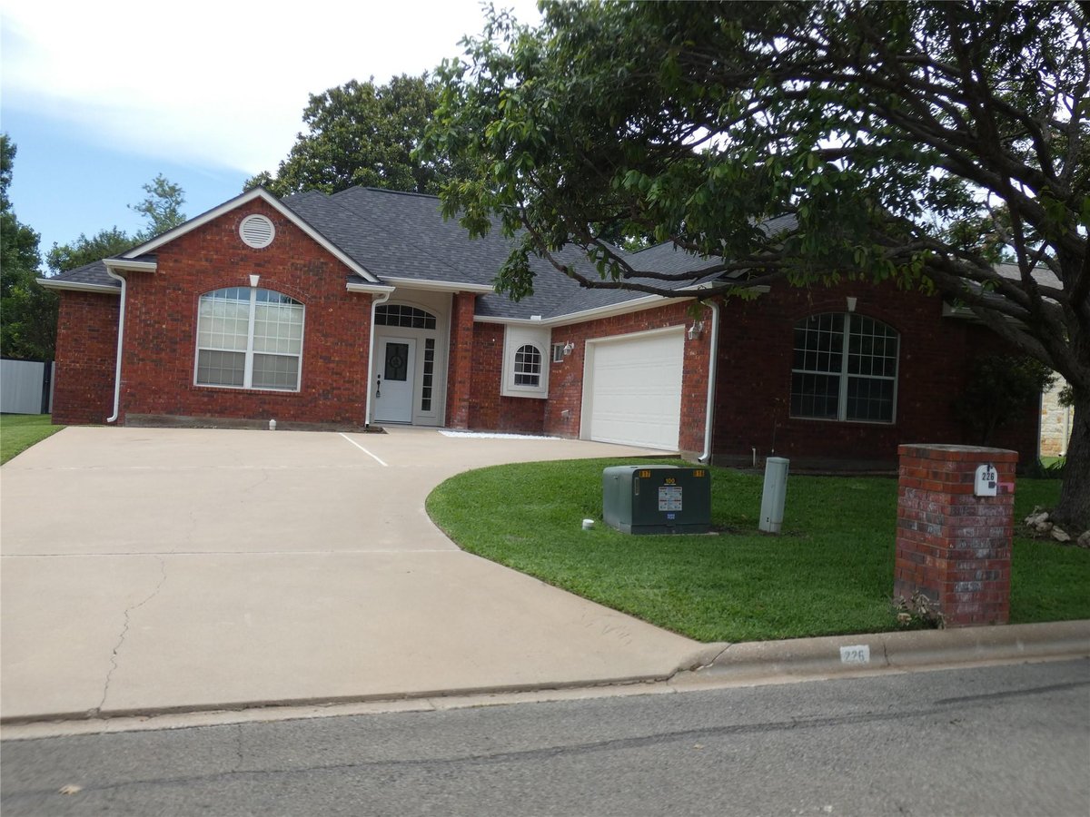 View 226 Muirfield ST in Meadowlakes 226 Muirfield ST - front exterior - Luxury home in Meadowlakes, Marble Falls, TX