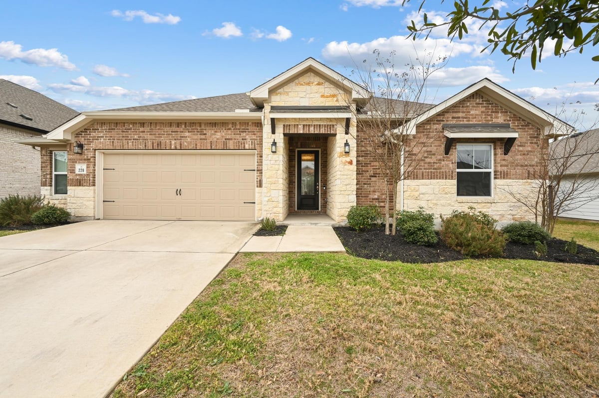 View 228 Helena Ln in Cypress Forest Ph Four Sec A 228 Helena Ln - front exterior - Luxury home in Cypress Forest Ph Four Sec A, Kyle, TX