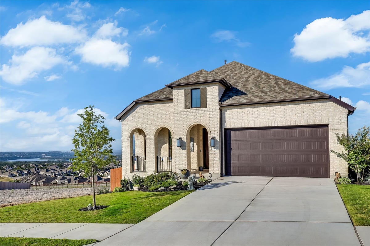 View 22809 Golden Daisy LN in Tessera/Lk Travis Ph 2a 22809 Golden Daisy LN - property photo 1 - Luxury home in Tessera/Lk Travis Ph 2a, Lago Vista, TX