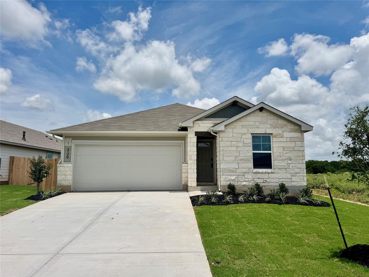 View 229 Red Tail Hawk LN in Riverbend at Double Eagle 229 Red Tail Hawk LN - front exterior - Luxury home in Riverbend at Double Eagle, Cedar Creek, TX