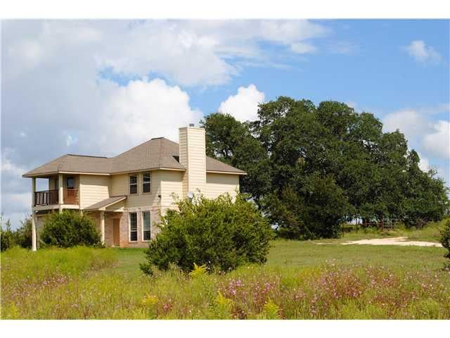 View 23 County Rd 289 23 County Rd 289 - front exterior - Luxury home in Georgetown, TX