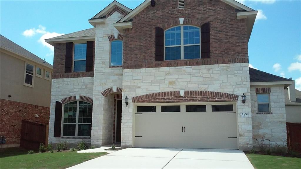 View 2300 Williston Loop in Bridges Of Bear Creek Ph 02 Sec 02 2300 Williston Loop - front exterior - Luxury home in Bridges Of Bear Creek Ph 02 Sec 02, Austin, TX