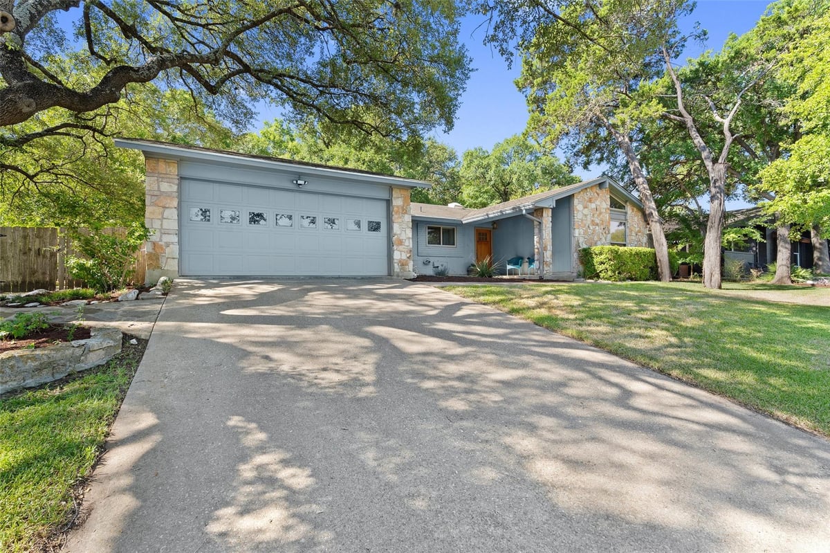 View 2301 Barton Hills Dr in Horseshoe Bend 2301 Barton Hills Dr - front exterior - Luxury home in Horseshoe Bend, Austin, TX