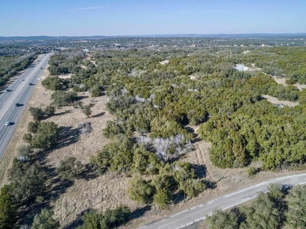 23010 Highway 71 Dr - front exterior - Luxury home in Paleface Park Ph I Sec B, Spicewood, TX