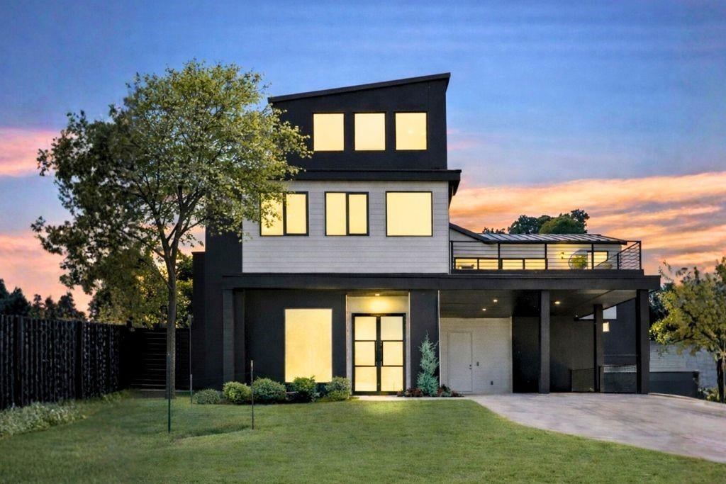 View 2303 Westworth Cir in West Park Add 2303 Westworth Cir - front exterior with modern black facade - Luxury home in West Park Add, Austin, TX