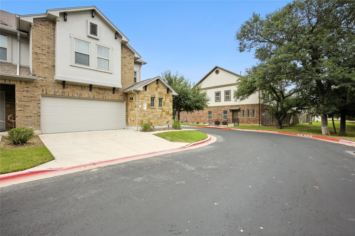 View 2304 S Lakeline Blvd Unit #501 in Arbors at Lakeline 2304 S Lakeline Blvd Unit #501 - front exterior - Luxury home in Arbors at Lakeline, Cedar Park, TX