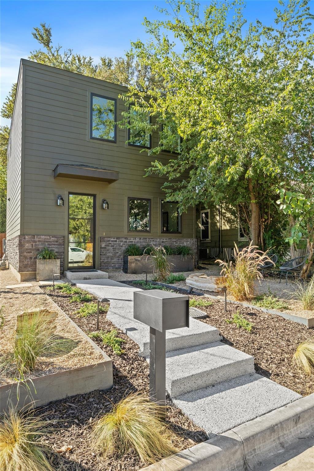 View 2305 E 21st St Unit #2 in Sunrise Add 2305 E 21st St Unit #2 - front exterior - Luxury home in Sunrise Add, Austin, TX