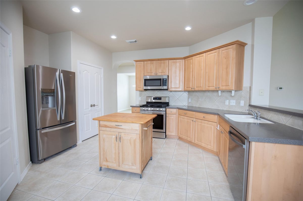 Kitchen at 2308 Lou John St - 4 bed 2 bath home
