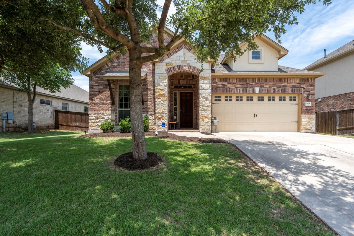 View 2308 Williston Loop in Bridges Of Bear Creek Ph 2 SE 2308 Williston Loop - front exterior - Luxury home in Bridges Of Bear Creek Ph 2 SE, Austin, TX