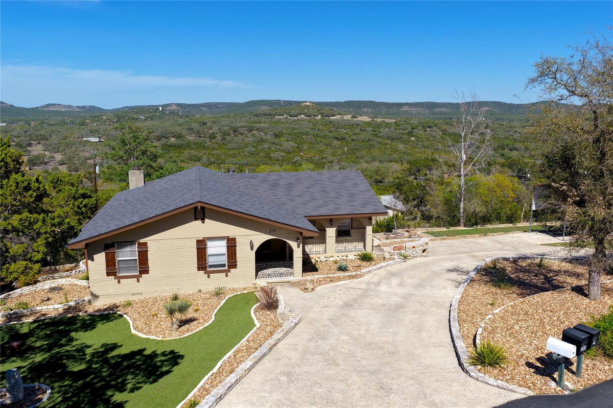 View 231 Vip Dr in Mount Lookout 1 231 Vip Dr - front exterior - Luxury home in Mount Lookout 1, Canyon Lake, TX
