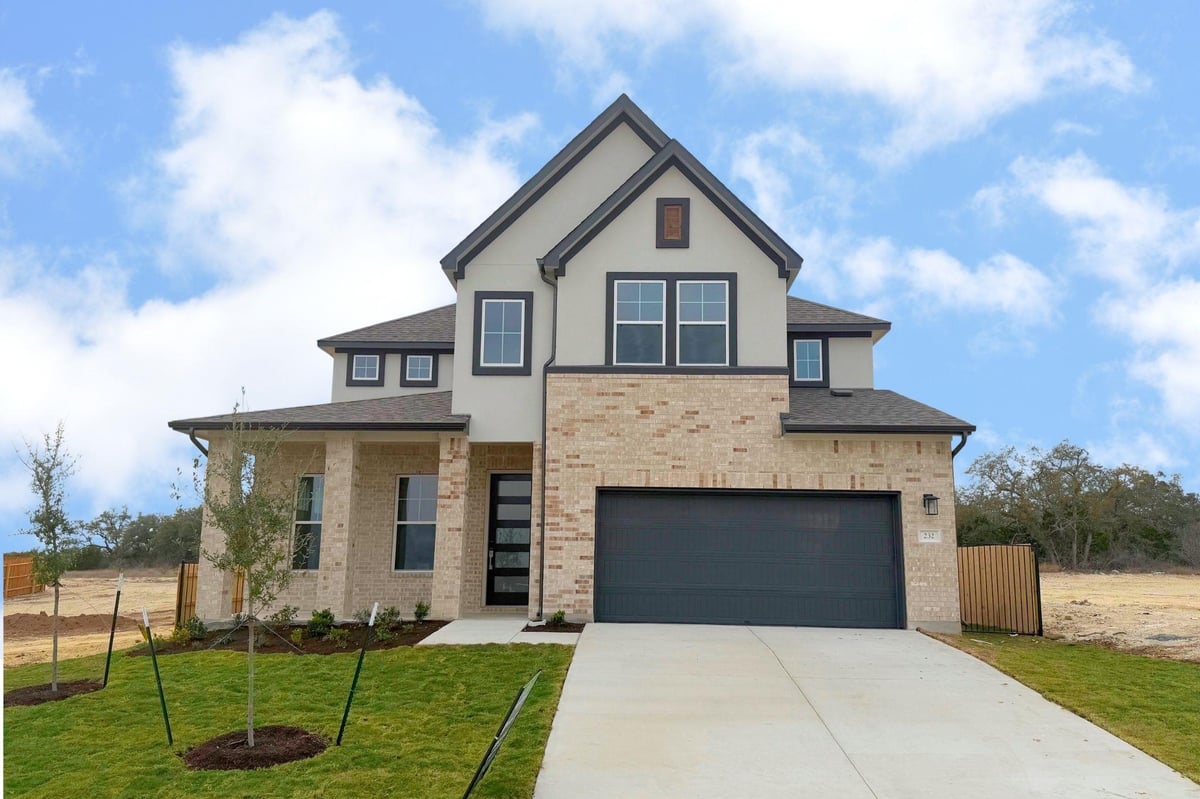 View 232 Archway Ln in Saddleback at Santa Rita Ranch 232 Archway Ln - front exterior - Luxury home in Saddleback at Santa Rita Ranch, Liberty Hill, TX
