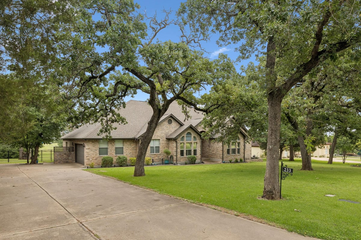 View 233 Colovista PKWY in Colovista Country Club 233 Colovista PKWY - property photo 1 - Luxury home in Colovista Country Club, Bastrop, TX