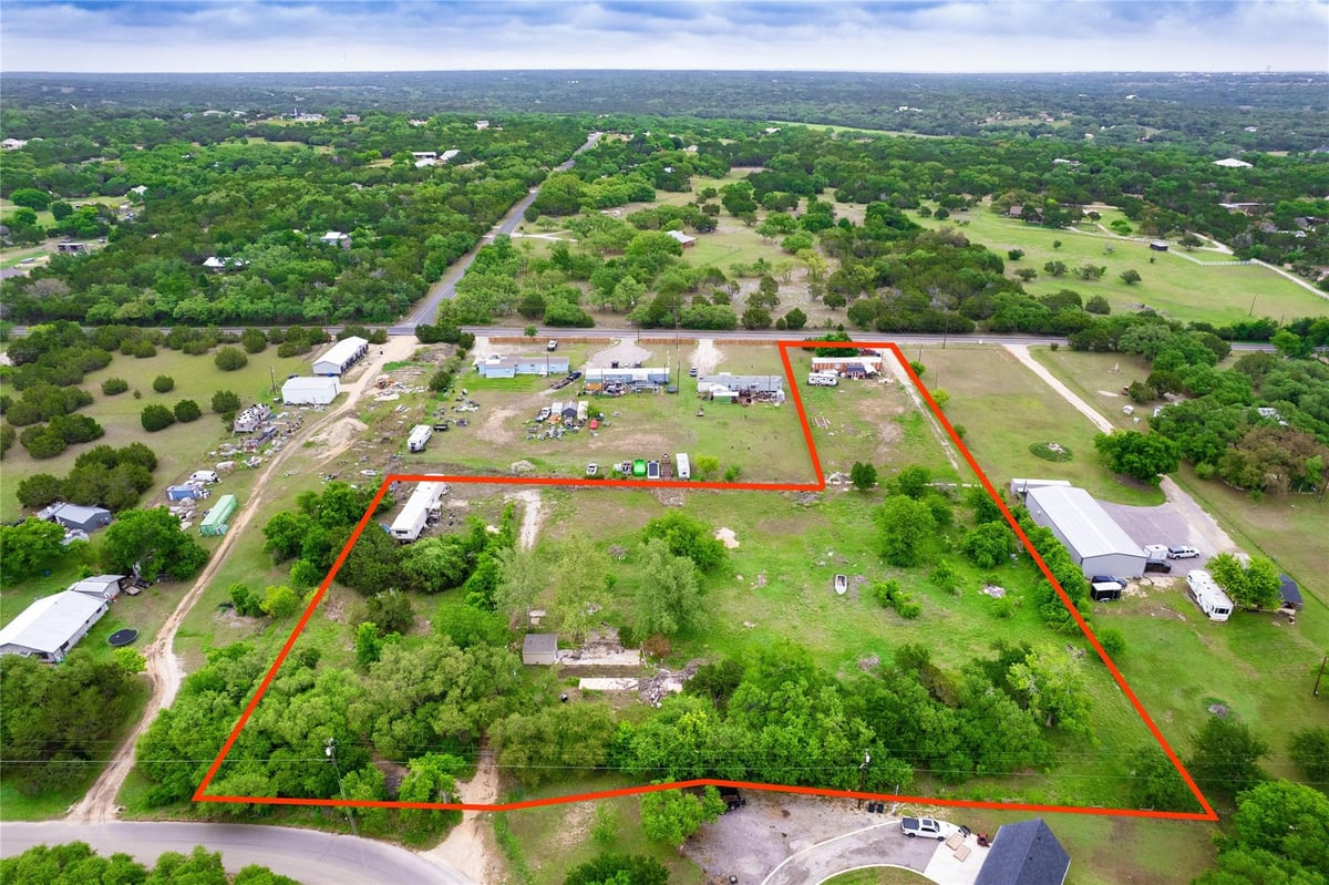 View 23300 Windy Valley Rd in Sandy Creek Ranches Ph 2 Sec 23300 Windy Valley Rd - front exterior - Luxury lot in Sandy Creek Ranches Ph 2 Sec, Leander, TX