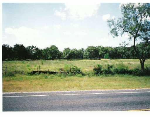 View 23400 State Hwy 71 23400 State Hwy 71 - front exterior - Luxury home in Spicewood, TX