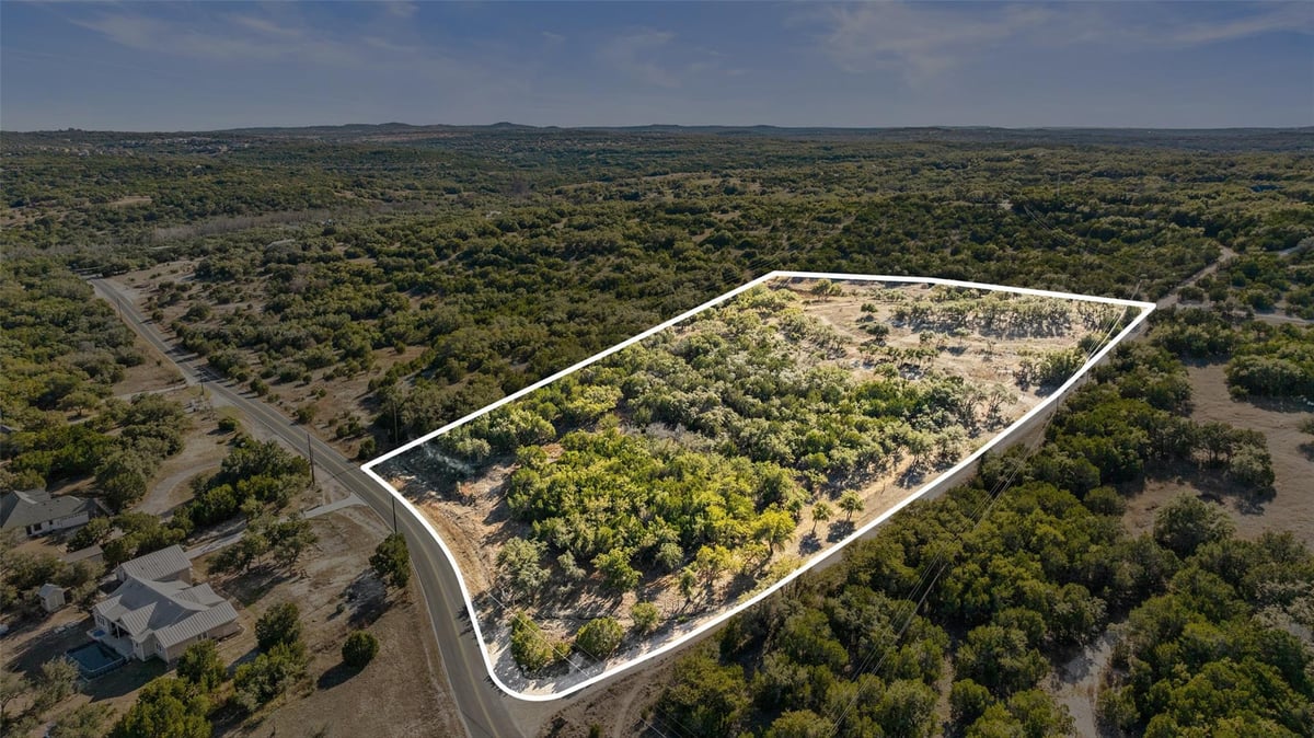23405 Pedernales Canyon Trl - front exterior - Luxury lot in ABS 13 SUR 1 GRITTEN, Spicewood, TX