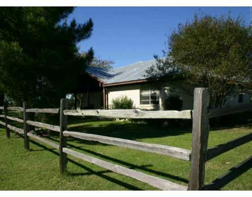 View 2350 Ranch road 1323 2350 Ranch road 1323 - front exterior - Luxury home in Johnson City, TX