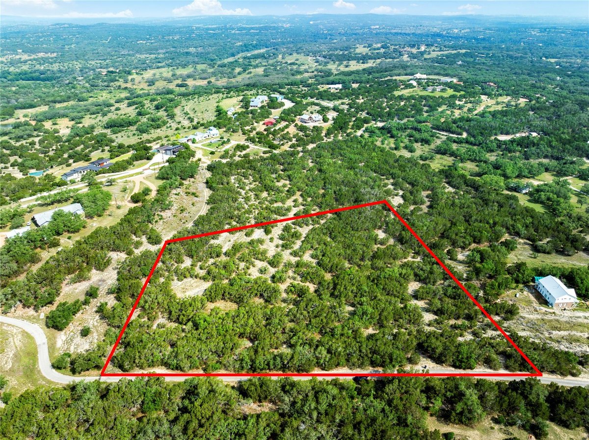 View 23519 Pedernales Canyon TRL Unit #6 in Edward Gritten League 23519 Pedernales Canyon TRL Unit #6 - front exterior - Luxury lot in Edward Gritten League, Spicewood, TX