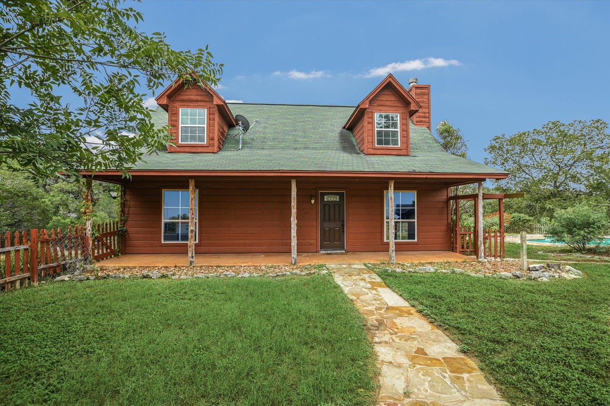 View 2355 Sandy Point RD in Burnett Ranch Sec 2 2355 Sandy Point RD - property photo 1 - Luxury home in Burnett Ranch Sec 2, Wimberley, TX