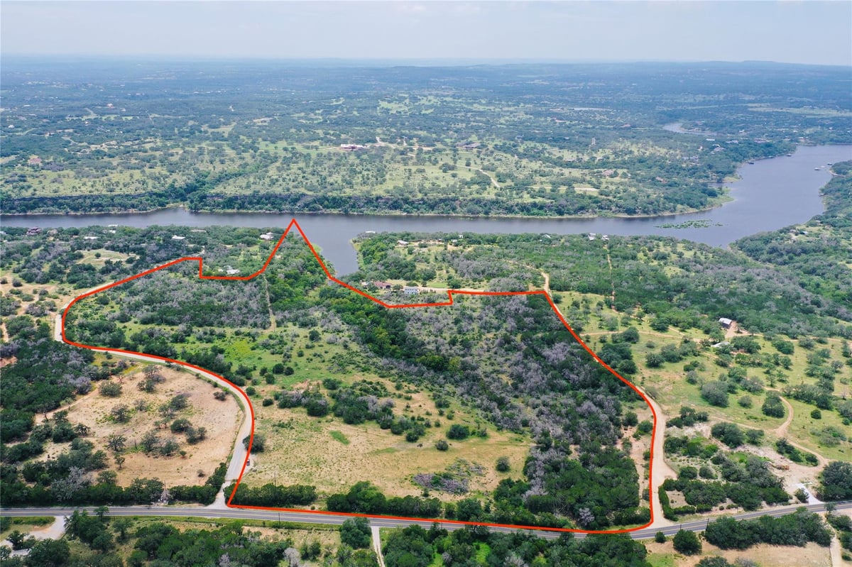 View 23601 Old Ferry Rd Unit #1 23601 Old Ferry Rd Unit #1 - front exterior - Luxury home in Spicewood, TX