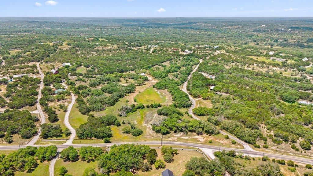 View 23625 Pedernales Canyon Trl in Pedernales Canyon 23625 Pedernales Canyon Trl - front exterior - Luxury home in Pedernales Canyon, Spicewood, TX