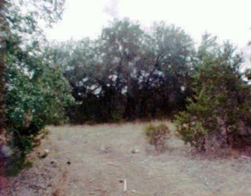 23716 Tres Coronas Rd - front exterior - Luxury lot in Spicewood, TX