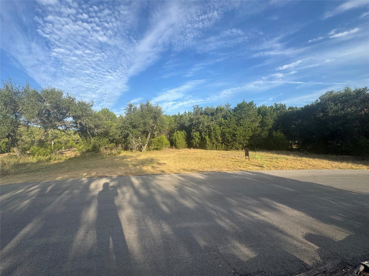View 238 Woodcreek Dr in Woodcreek Sec 1 238 Woodcreek Dr - property photo 1 - Luxury lot in Woodcreek Sec 1, Wimberley, TX