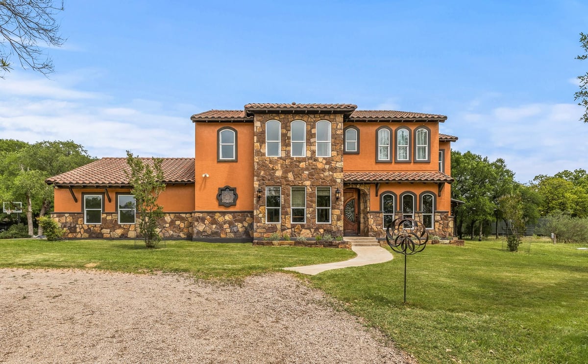 23802 Oscar Rd - front exterior - Luxury home in Paleface Ranch Sec 02A, Spicewood, TX