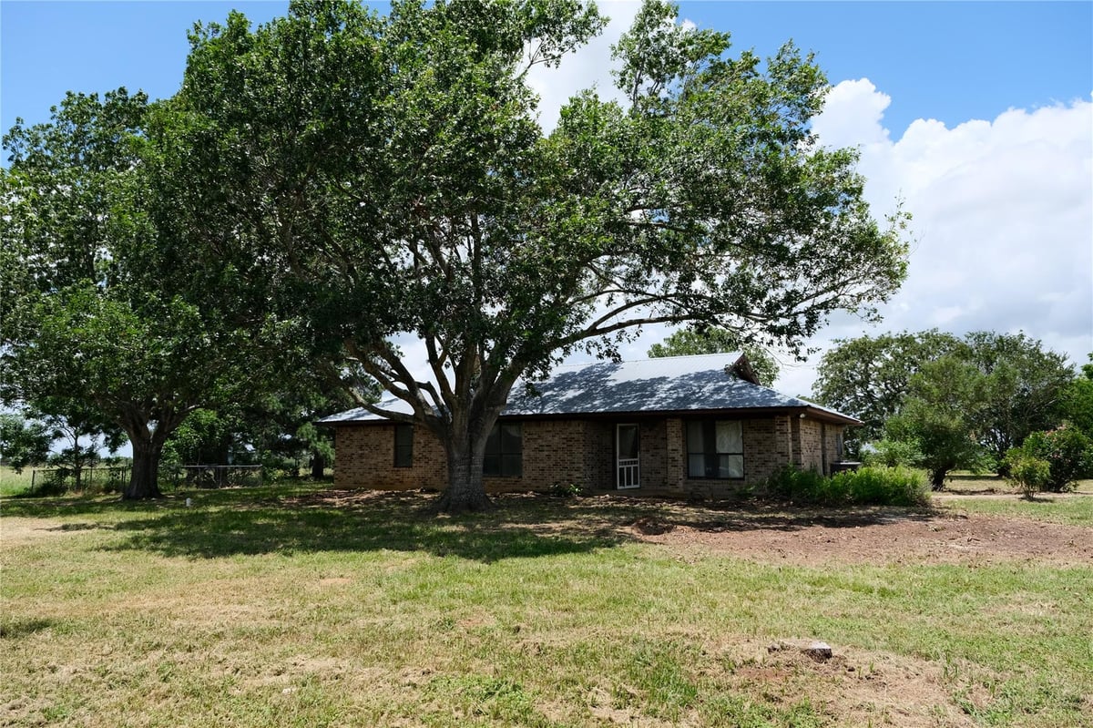 View 240 McAcres DR in Little McAcres 240 McAcres DR - front exterior - Luxury home in Little McAcres, McDade, TX