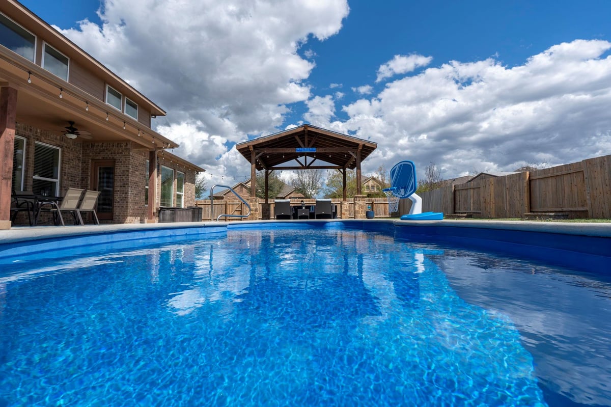 View 240 Parkrose Dr in Sunfield Ph Two Sec Four 240 Parkrose Dr - property photo 1 - Luxury home in Sunfield Ph Two Sec Four, Buda, TX