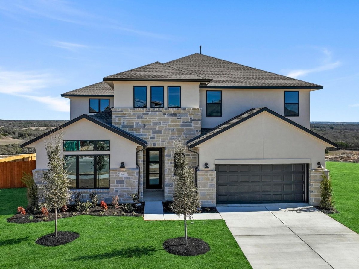 View 240 Sheepdog Dr in Lariat 240 Sheepdog Dr - front exterior - Luxury home in Lariat, Liberty Hill, TX