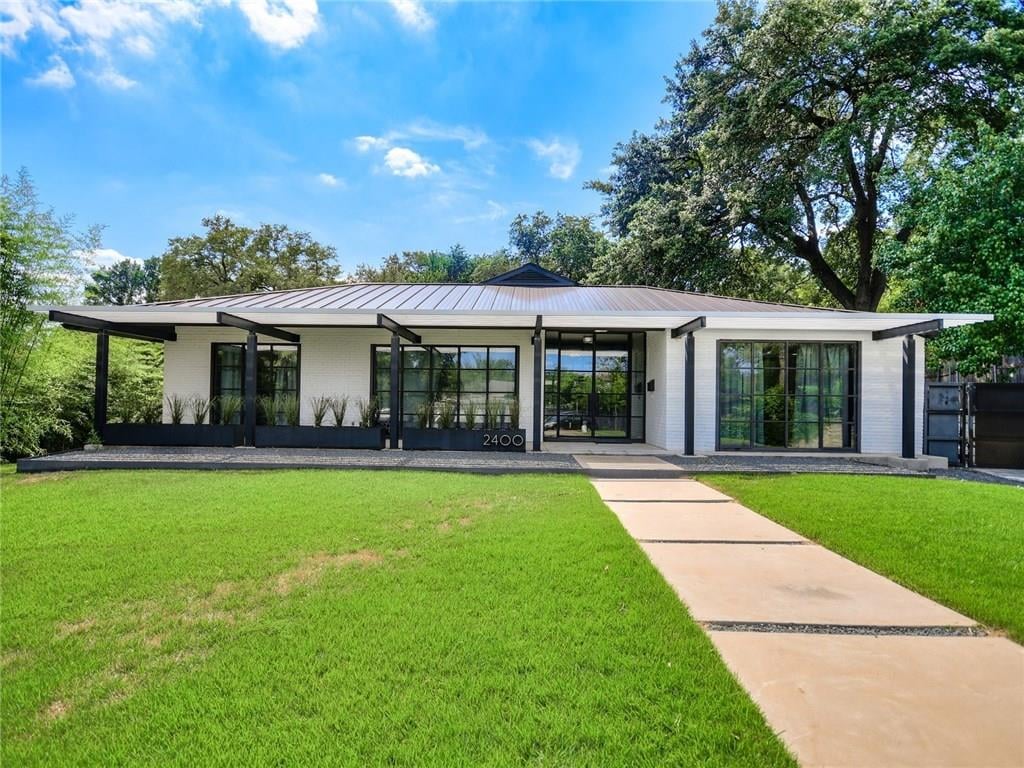 View 2400 Pemberton Pl in Pemberton Heights Sec 11 2400 Pemberton Pl - front exterior - Luxury home in Pemberton Heights Sec 11, Austin, TX