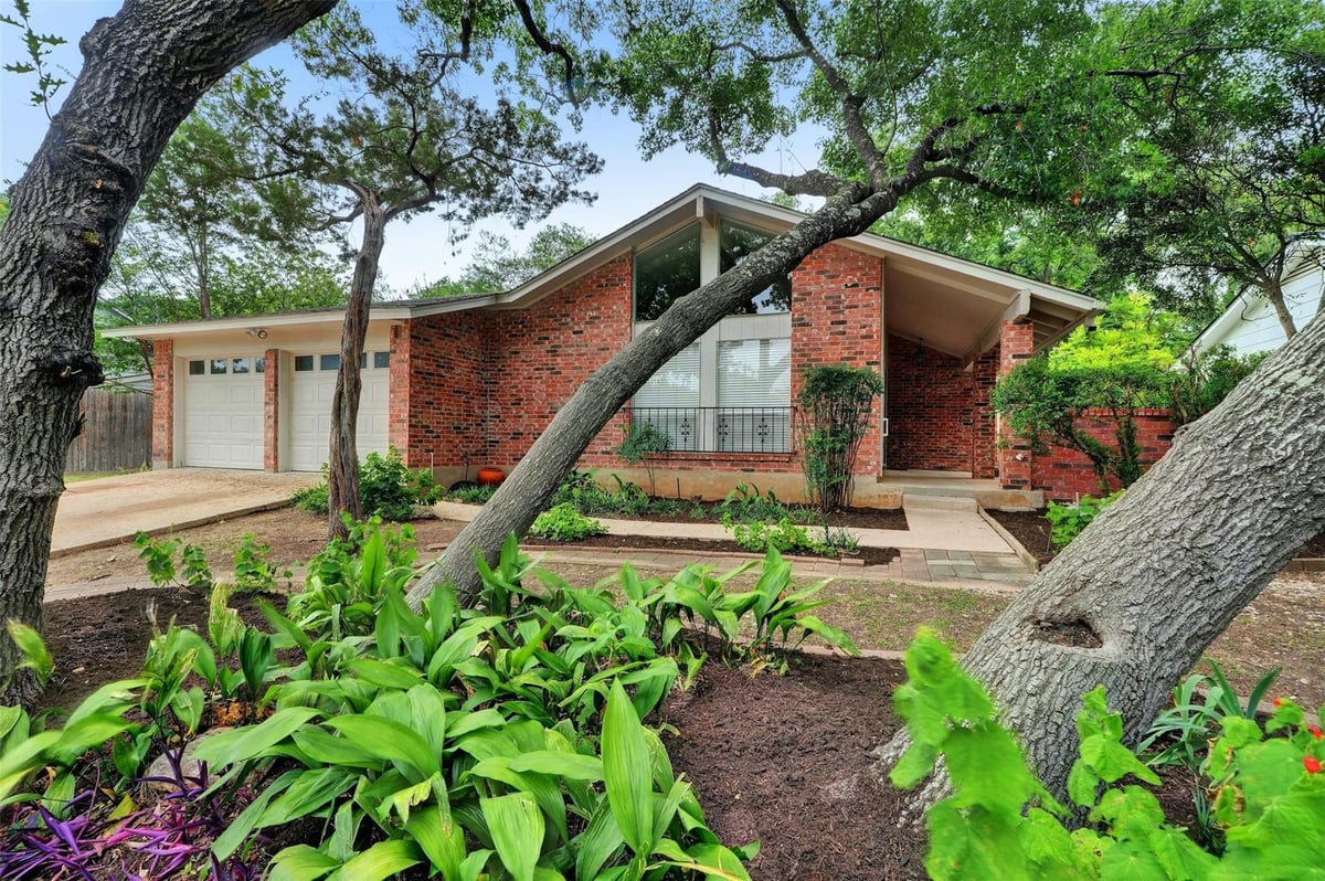 View 2401 Forest Bend Dr in Horseshoe Bend 2401 Forest Bend Dr - front exterior - Luxury home in Horseshoe Bend, Austin, TX