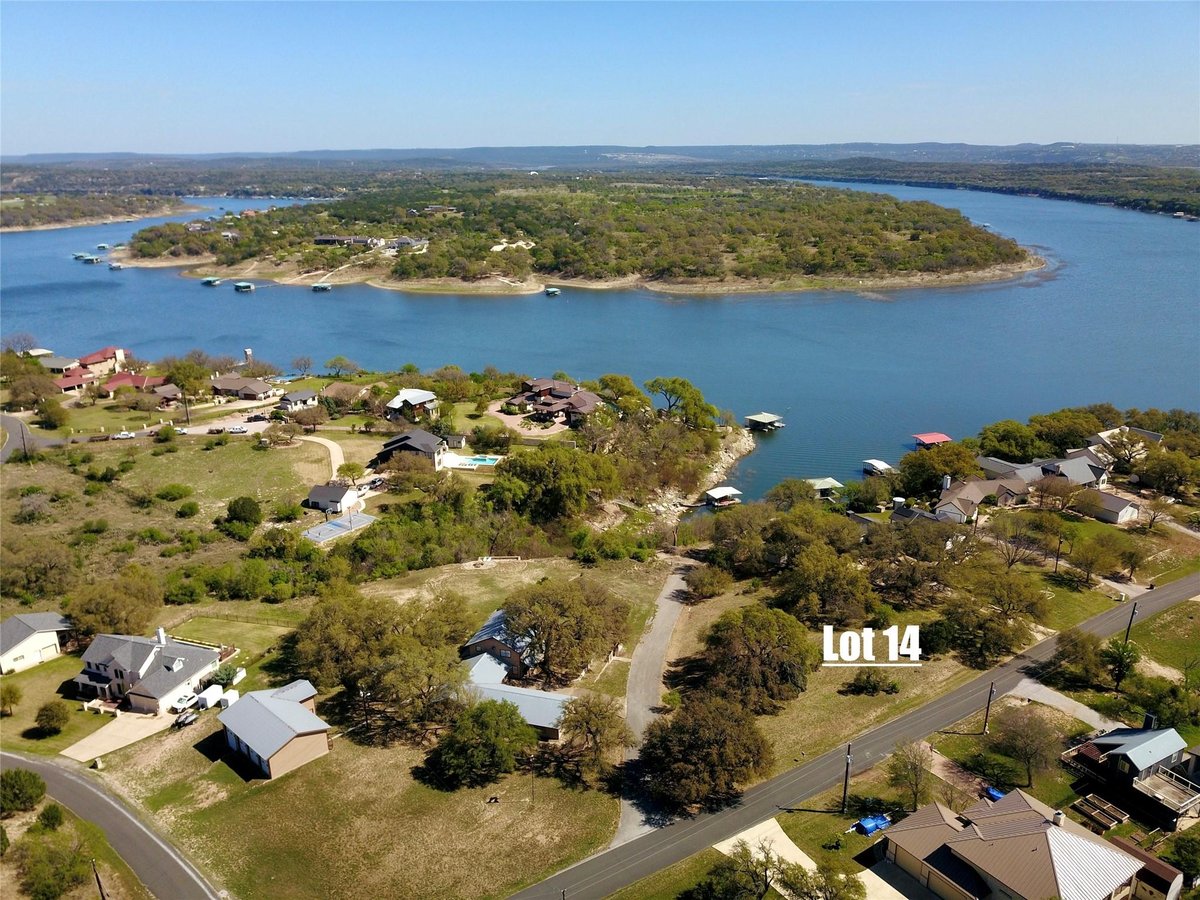 View 24014 Haynie Flat Rd in Naumanns Camp Amd 24014 Haynie Flat Rd - front exterior - Luxury lot in Naumanns Camp Amd, Spicewood, TX