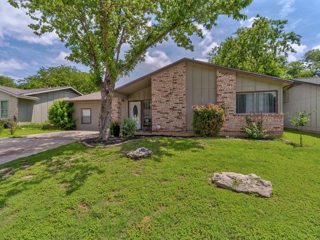 View 2402 Dovehill Dr in Wagon Crossing Sec 04 2402 Dovehill Dr - front exterior - Luxury home in Wagon Crossing Sec 04, Austin, TX