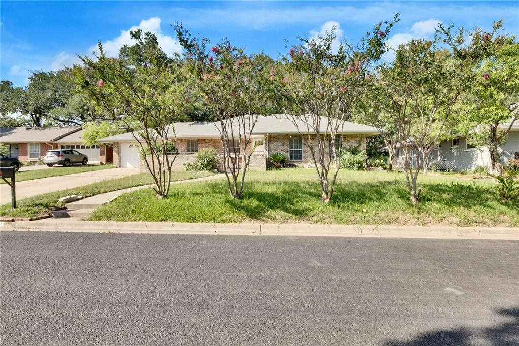 View 2406 Sheri Oak LN in Oak Valley Park Sec 03 2406 Sheri Oak LN - property photo 1 - Luxury home in Oak Valley Park Sec 03, Austin, TX