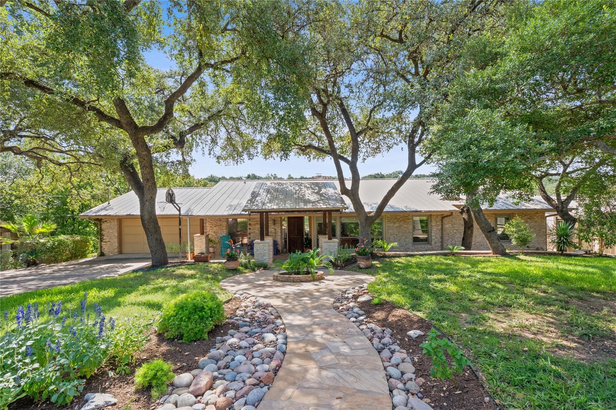 View 2407 Trail Of The Madrones in Westlake Highlands Sec 02 2407 Trail Of The Madrones - front exterior - Luxury home in Westlake Highlands Sec 02, Austin, TX