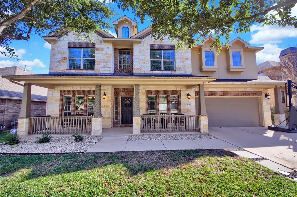 View 2409 Turtle Mountain Bnd in Bridges At Bear Creek Ph 2 SE 2409 Turtle Mountain Bnd - front exterior - Luxury home in Bridges At Bear Creek Ph 2 SE, Austin, TX