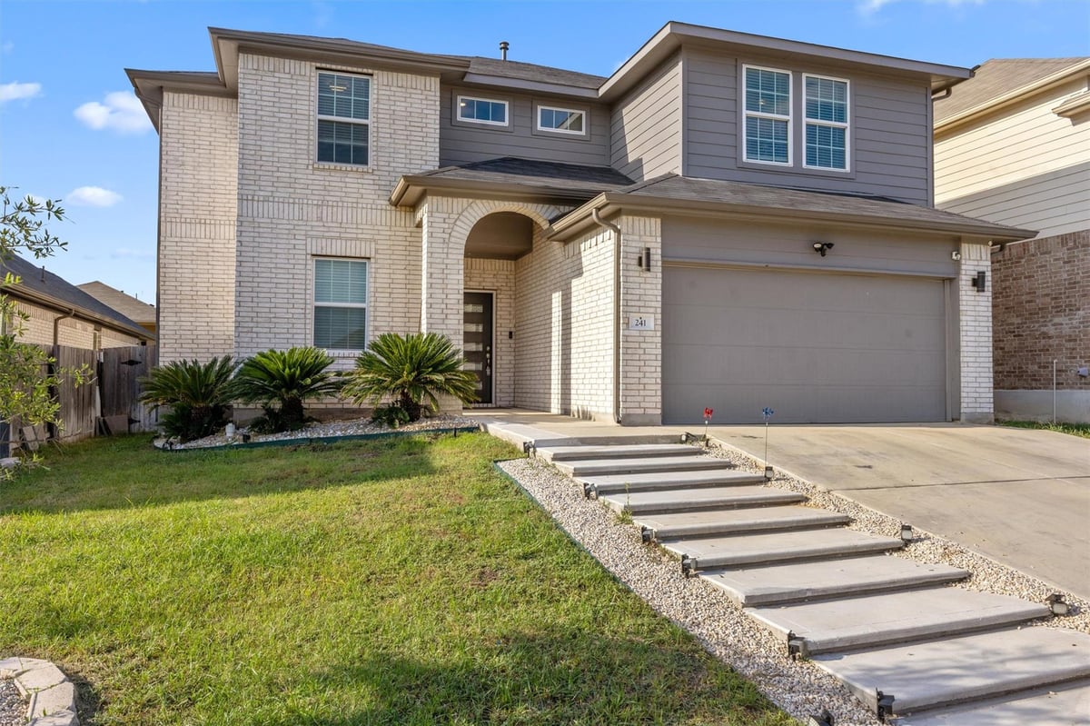 View 241 Oleander Loop in Sunfield Ph Three Sec Five B 241 Oleander Loop - front exterior - Luxury home in Sunfield Ph Three Sec Five B, Buda, TX